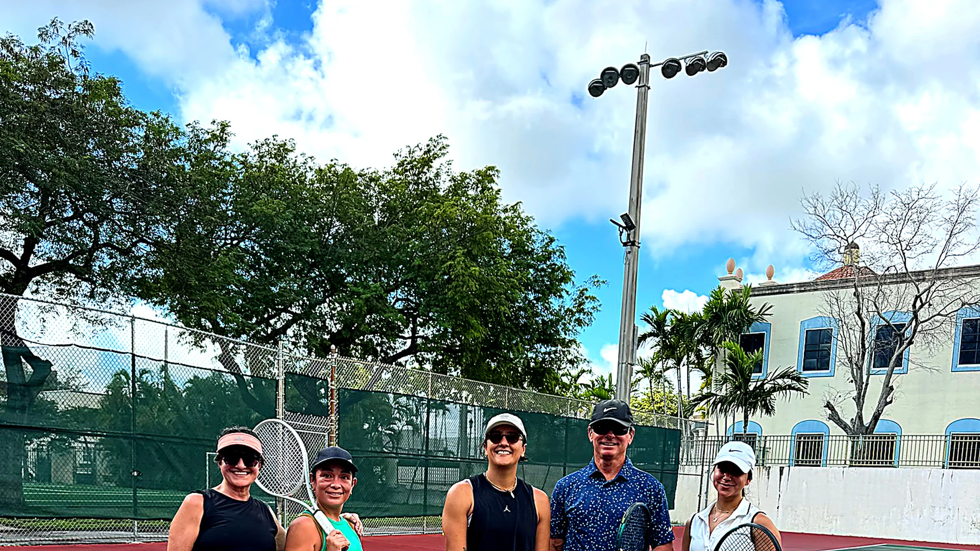TennisFIT group session on court, Miami